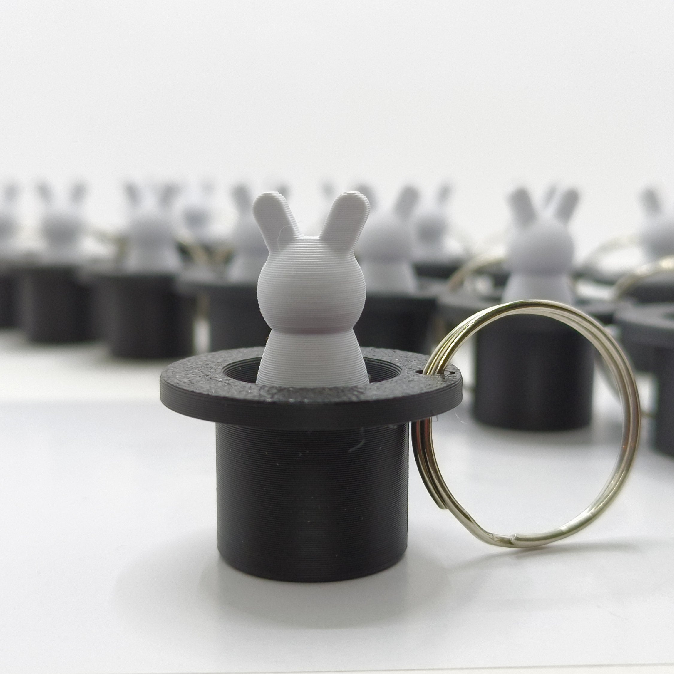 RABBIT FROM A HAT KEYCHAIN